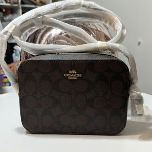 Coach signature cross body bag